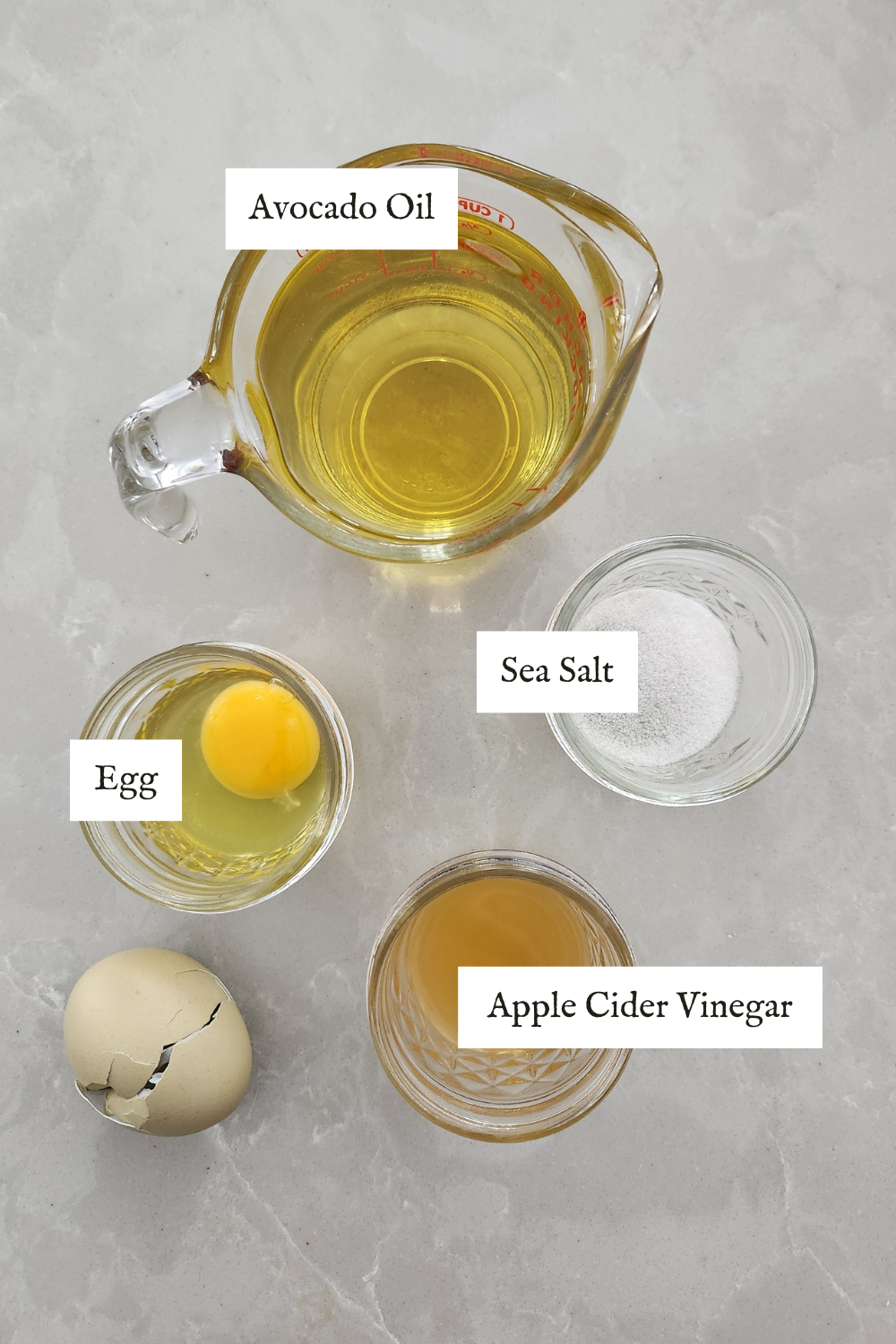 ingredients for homemade mayonnaise on a counter